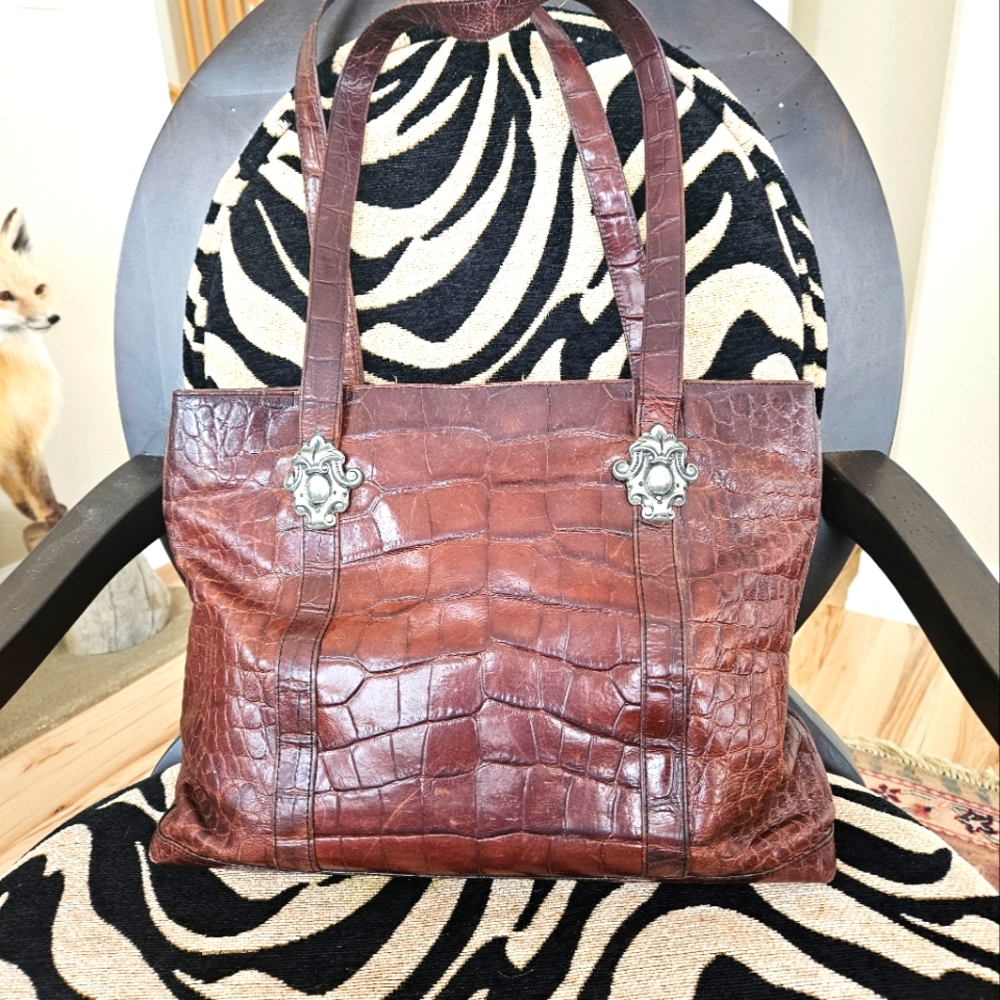 Leather tote with silver buckles